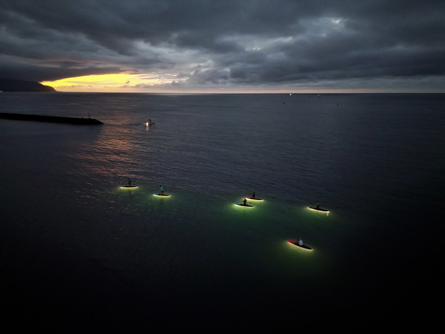 Glowing Night-Time Paddleboard on the North Shore